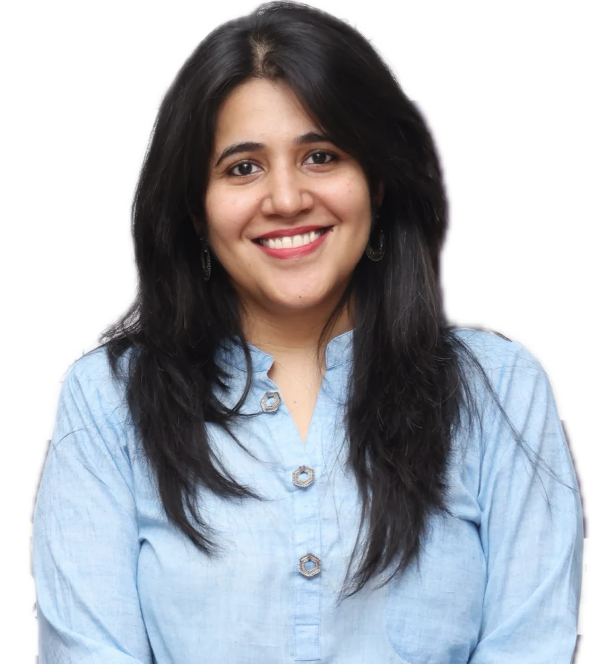 Dr. Nitika Grover smiling, wearing a blue kurta